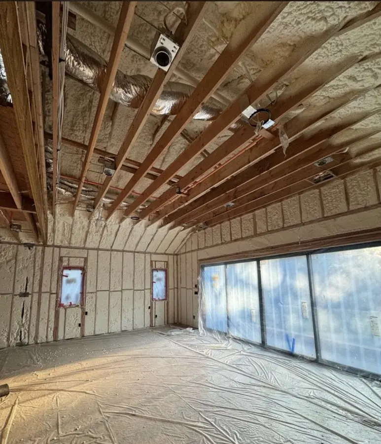 Interior walls and ceiling insulated with spray foam during new construction in Diboll